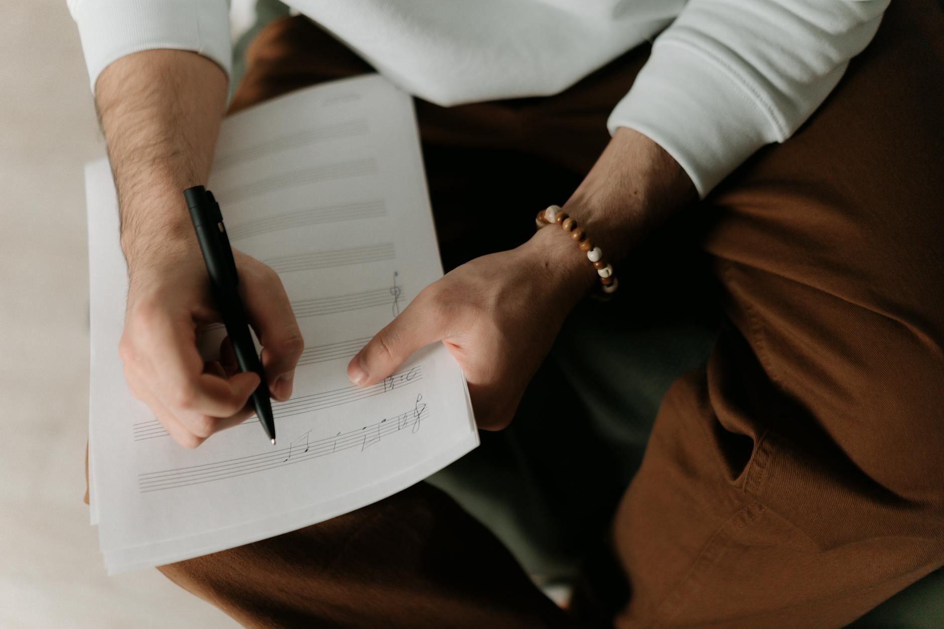 a person holding a pen