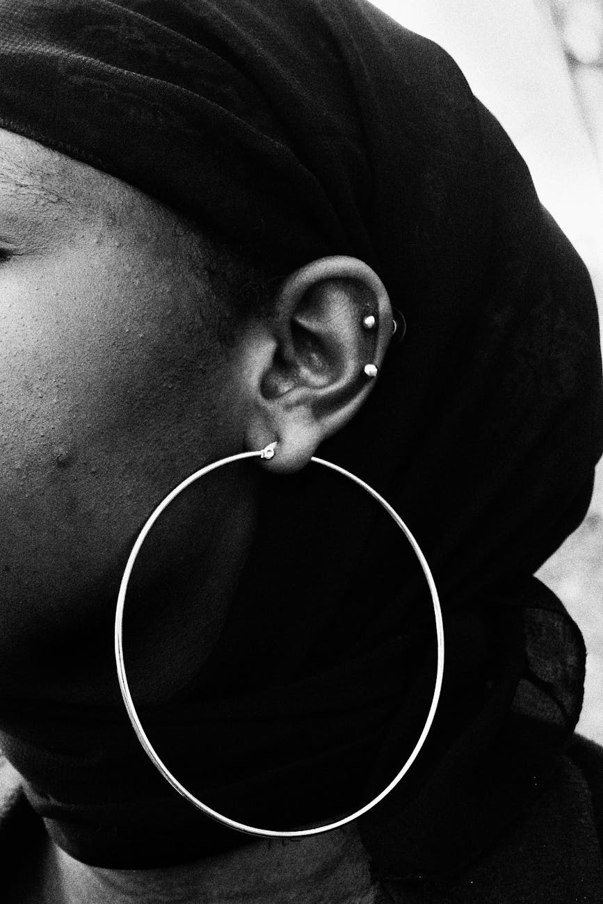 woman wearing big hoop earring