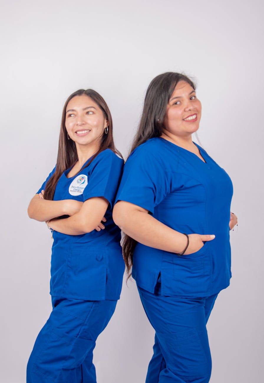 confident medical professionals in scrubs