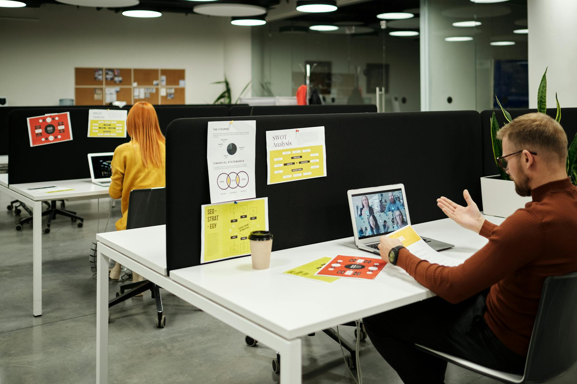 man having online meeting in office